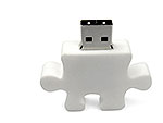 USB-Stick in Form eines Puzzleteils, individuell bedruckbar und ideal für kreative Werbezwecke.