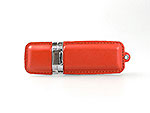 USB-Stick in leuchtendem Orange mit elegantem Metallclip und Platz für individuelles Branding.