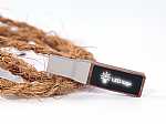 USB-Stick mit elegantem Holzdesign und beleuchtbarem Logo-Bereich für individuelle Werbeanbringung.
