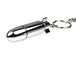 USB-Stick in Form einer Torpedobombe mit glänzendem Gehäuse und integriertem Schlüsselanhänger für Mobilität.